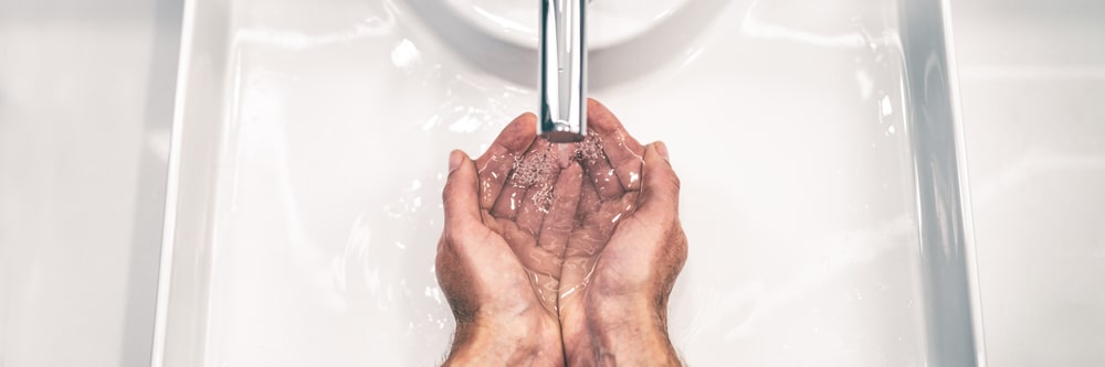 hands washing with clean water
